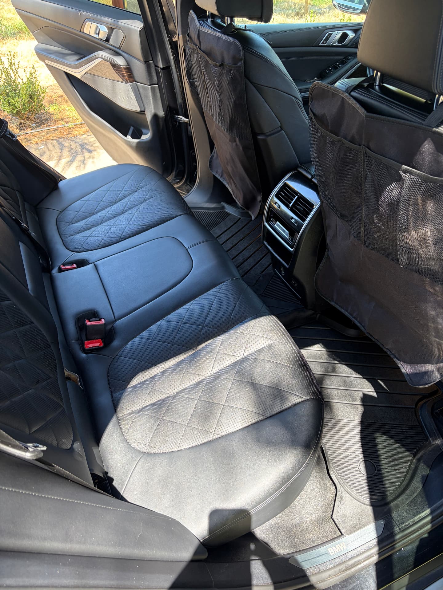Same BMW back seat spotless, conditioned and like new after interior detailing